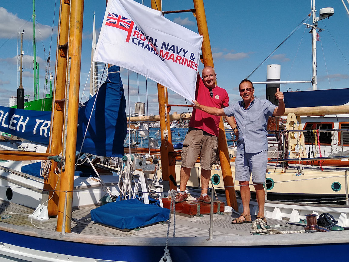 Mark and Chris onboard with the Flag